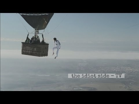 Daredevils attempt to walk between two hot air balloons at 10,000ft